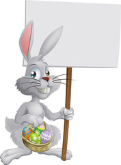 Easter bunny with eggs and sign