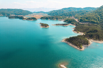 Aoos Springs Lake in the Metsovo in Epirus. mountains of Pindus in northern Greece. Techniti Limni Aoou Lake. Aerial view, top view, drone