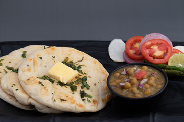 Chole Kulche Also Called Matar Kulcha, Chhole Kulche Is Widely Popular Delhi Street Food. The Dish Comprises Of Mildly Leavened Soft Fluffy Flatbread Made Of Maida And White Peas Or Safed Matar Curry