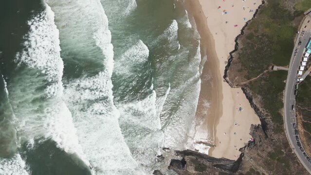 Aerial view of beautiful wild cliff coastline near Odeceixe, Faro, Portugal.