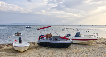 Naklejka premium fishing boats on the beach