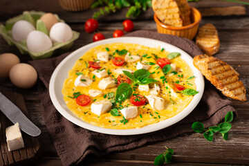 Eggs omelette with vegetables - 529184214