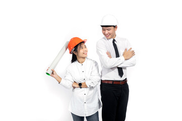 Male and female engineer wear a helmet and posing with a blueprint isolated on white background.