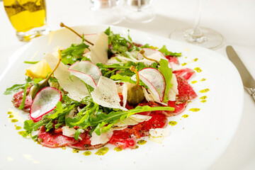 carpaccio with arugula and parmesan