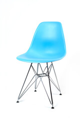 Blue color chair, modern designer. Chair isolated on white background. Kitchen or home furniture with iron legs