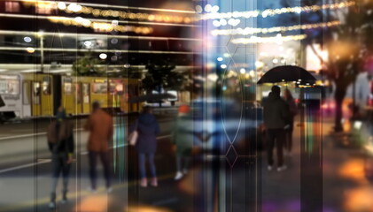 night city  blurred light , car traffic view from  rainy  windows ,  people walk with umbrella cold...