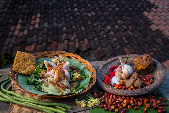 traditional food of indonesia (pecel). 
pecal is a food that uses peanut sauce as the main ingredient mixed with various types of vegetables. Indonesian dish.