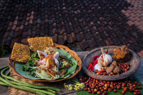 traditional food of indonesia (pecel). 
pecal is a food that uses peanut sauce as the main ingredient mixed with various types of vegetables. Indonesian dish.