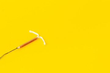 Intrauterine contraceptive device closeup. Birth control contraception concept