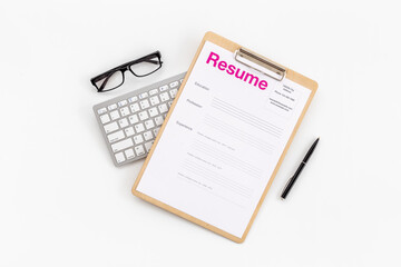 Searhing for a new job. Resume application form on office table