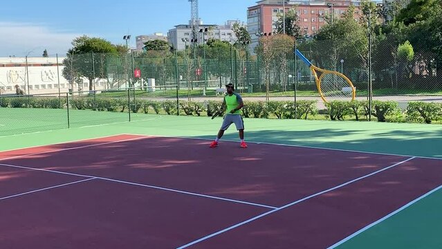Slow Motion Medium Shot Playback in Lisbon court. forehand with spin.