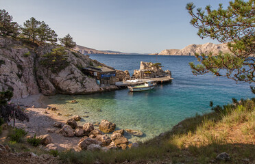 Beautiful seascape of a hidden beach with rocky coast and clear waters of the Mediterranean Sea near Baska at the island of Krk, Croatia