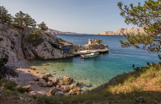 Beautiful seascape of a hidden beach with rocky coast and clear waters of the Mediterranean Sea near Baska at the island of Krk, Croatia