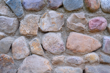 Natural stone wall. Abstract stone texture. Close up.