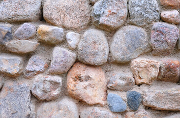 Natural stone wall. Abstract stone texture. Close up.