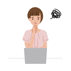 デスクで座ってPCを開いて困っているオフィスカジュアルの女性