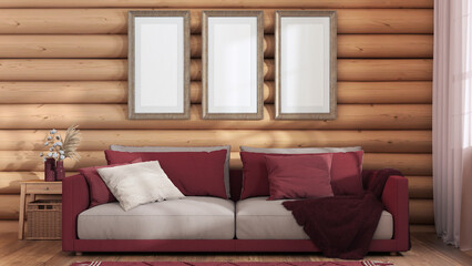 Log cabin living room in red and beige tones, front view. Frame mock up, fabric sofa with pillows. Farmhouse interior design