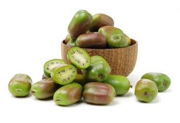 mini kiwi baby fruit (actinidia arguta) on white background 