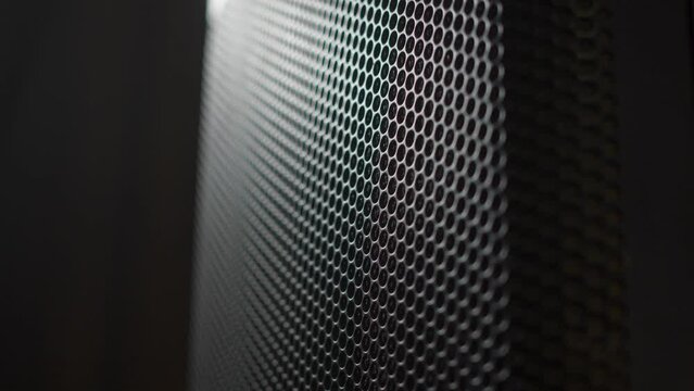 Close up shot of a round speaker