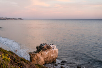 Sunset by the ocean at El Matador Beach.Malibu, California. High angle view