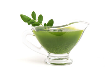 Moringa extracted with water isolated on white background.