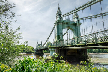 Hammersmith bridge over Thames river in London, UK