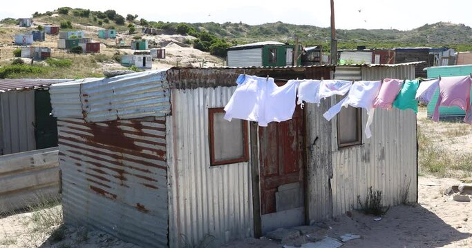 a shack built out of tin in khayelitsha growing township.