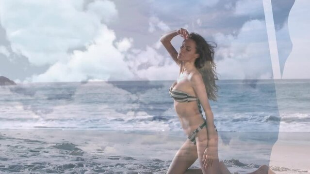 Animation of clouds over caucasian woman in bikini on beach by seaside
