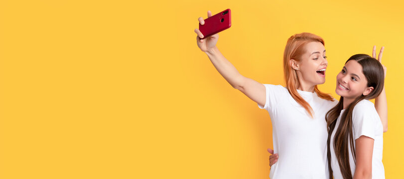 Mother and daughter kid banner, copy space, isolated background. modern life. mobile technology. having video call. mother and daughter vlogging.