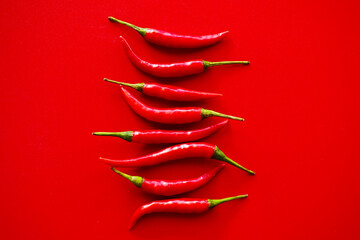 red hot chili peppers on red background