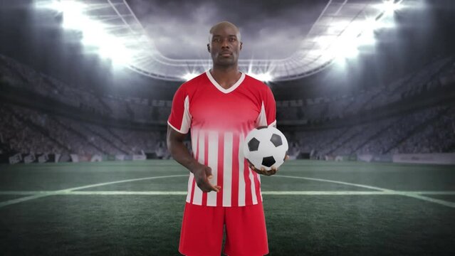 Animation of stadium over african american male soccer player