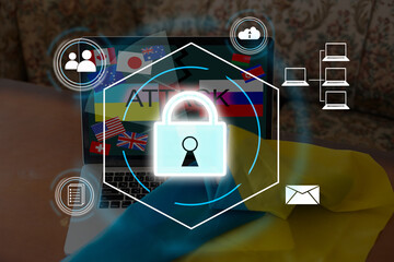 Technology concept with cyber security internet and networking, laptop, screen padlock icon on digital display. flag of Ukraine