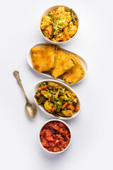 Bengali Bhog food for Indian Hindu Durga Puja or pooja festival. Khichadi, labra, tomato chutney