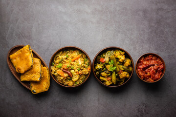 Bengali Bhog food for Indian Hindu Durga Puja or pooja festival. Khichadi, labra, tomato chutney