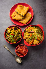 Bengali Bhog food for Indian Hindu Durga Puja or pooja festival. Khichadi, labra, tomato chutney