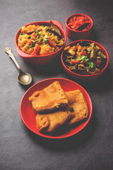 Bengali Bhog food for Indian Hindu Durga Puja or pooja festival. Khichadi, labra, tomato chutney