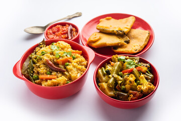 Bengali Bhog food for Indian Hindu Durga Puja or pooja festival. Khichadi, labra, tomato chutney