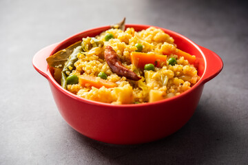 Bengali dish khichdi or khichuri made from a combination of lentils and rice and vegetables