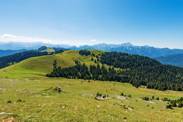 Fototapeta na wymiar Panoramic view of Carnic Alps and Julian Alps, from the mountain peak of Osternig or Oisternig. Italy Austria border, Europe. Tarvisio, Udine province, Friuli Venezia Giulia.