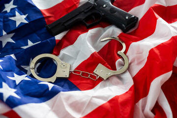 History. handcuffs and gun USA flag
