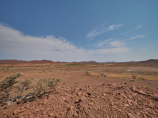 Gravel road through the arid region of the Damarland Namibia