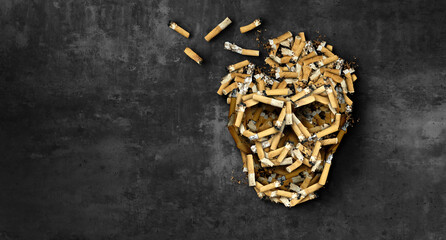 The dangers of Smoking and health damage as a medical concept with cigarettes shaped as a human skull as a nicotine addiction and addicted smoker habit risk