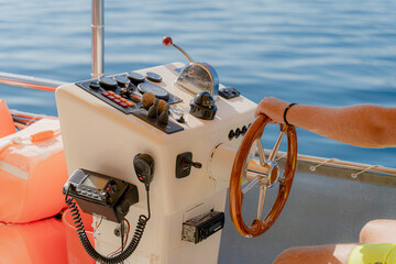 Steering wheel. The steering wheel in the boat.