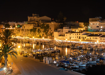 Cuitadella harbour in Menorca at night 