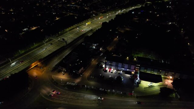 Aerial View of British Motorways With Fast Moving Traffic at Peak Time. M1 J11 and  J7 Motorways Junction Interchange. Time Lapse Shot captured on 7th Sep 2022