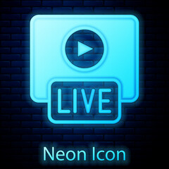 Glowing neon Live streaming online videogame play icon isolated on brick wall background. Vector