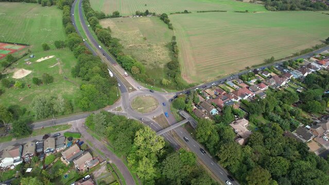 Aerial View of British Motorways With Fast Moving Traffic at Peak Time. M1 J11 and  J7 Motorways Junction Interchange. Time Lapse Shot captured on 7th Sep 2022