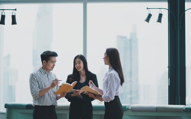 Obraz premium Asian adult Asian brainstorming business businessman.Colleagues from computer communication company.human lifestyle laptop online office meeting