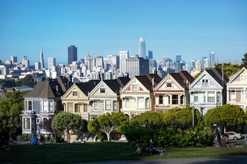 Scenic view over the historic houses on the hillside in the foreground from Alamo Square in San...