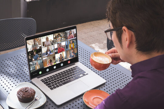 Asian businessman having video call with colleagues
